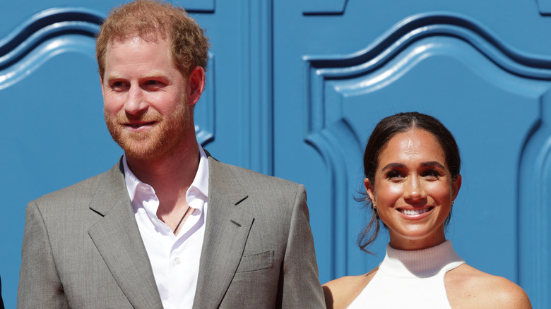 Prince Harry and Meghan Markle smiling