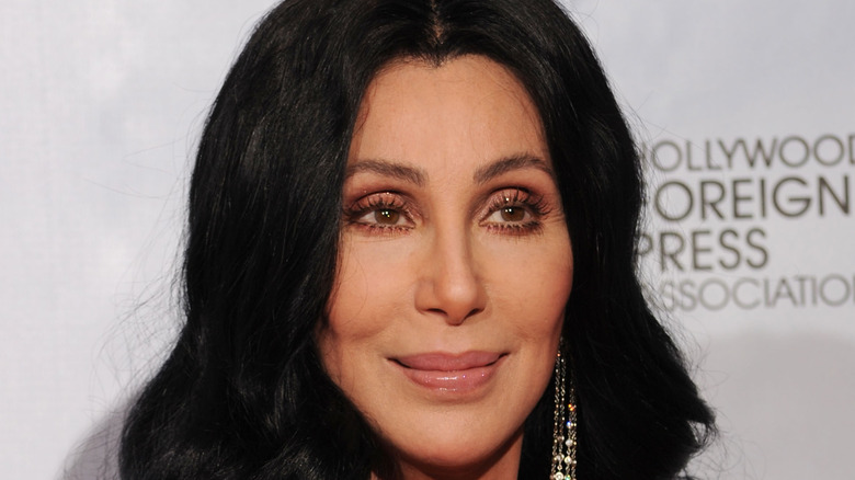 Cher with one earring