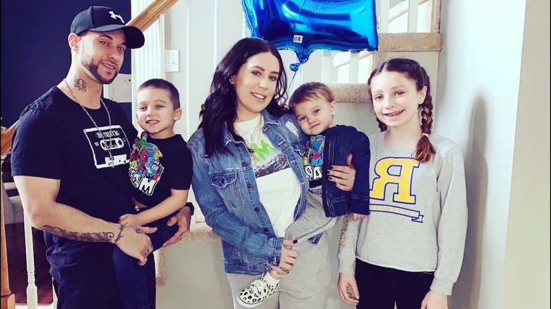 Nathan Mathers poses with wife Ashley, kids Audrianna, Liam and Carter
