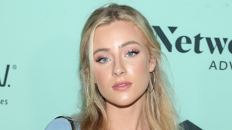 Daisy Keech looking at camera