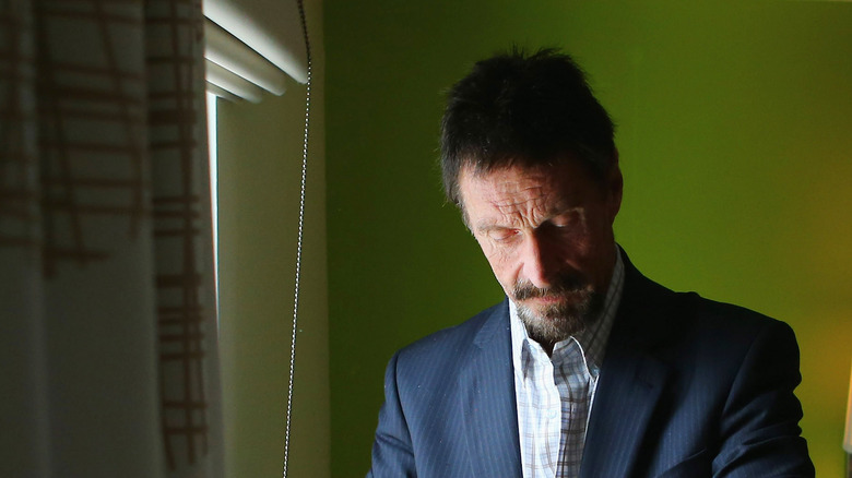John McAfee in hotel room