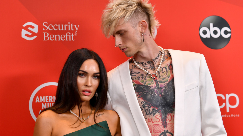 Megan Fox and Machine Gun Kelly attend an event