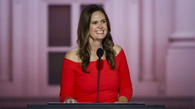 Arkansas Governor Sarah Huckabee Sanders speaking on stage on the second day of the Republican National Convention