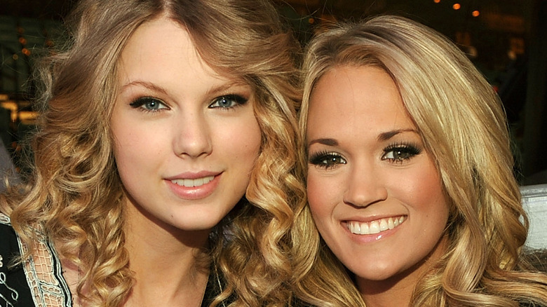 Taylor Swift and Carrie Underwood smiling