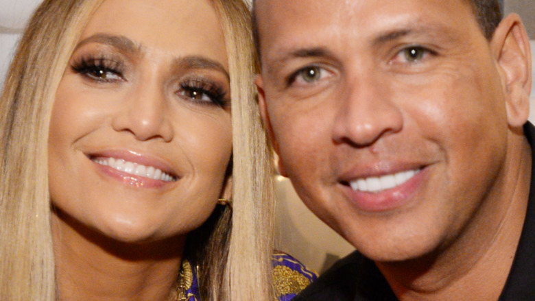 Jennifer Lopez and Alex Rodriguez smiling