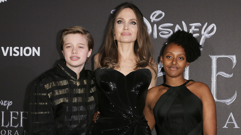 Shiloh Jolie-Pitt, Angelina Jolie, and Zahara Jolie-Pitt at the "Maleficent: Mistress of Evil" premiere