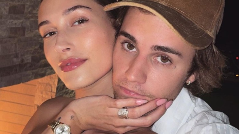 Hailey Baldwin and Justing Biber posing cheek to cheek for a selfie