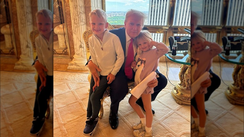 Luke, Carolina Trump posing with Donald Trump