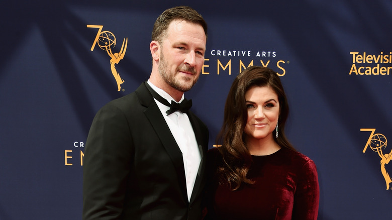 Tiffani Thiessen and Brady Smith smiling