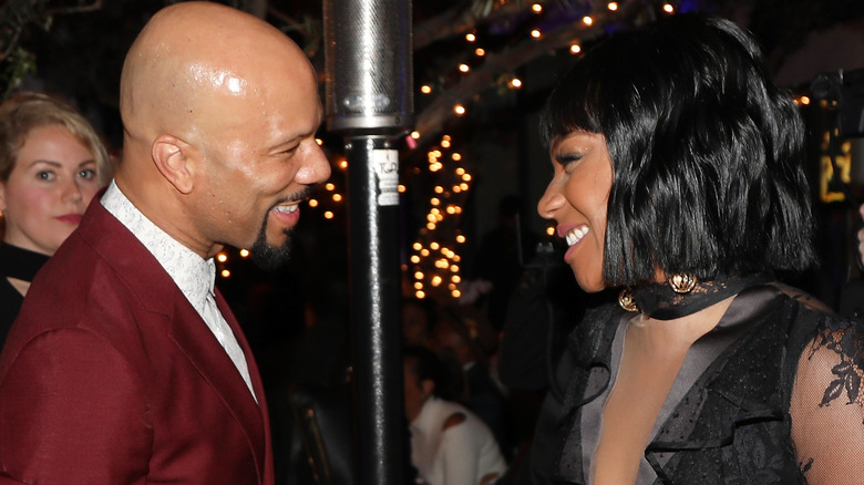 Tiffany Haddish and Common at a party 