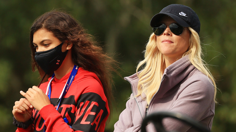 Sam Woods, Elin Nordegren watching