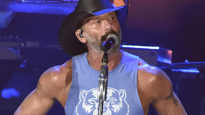 Tim McGraw performs on stage