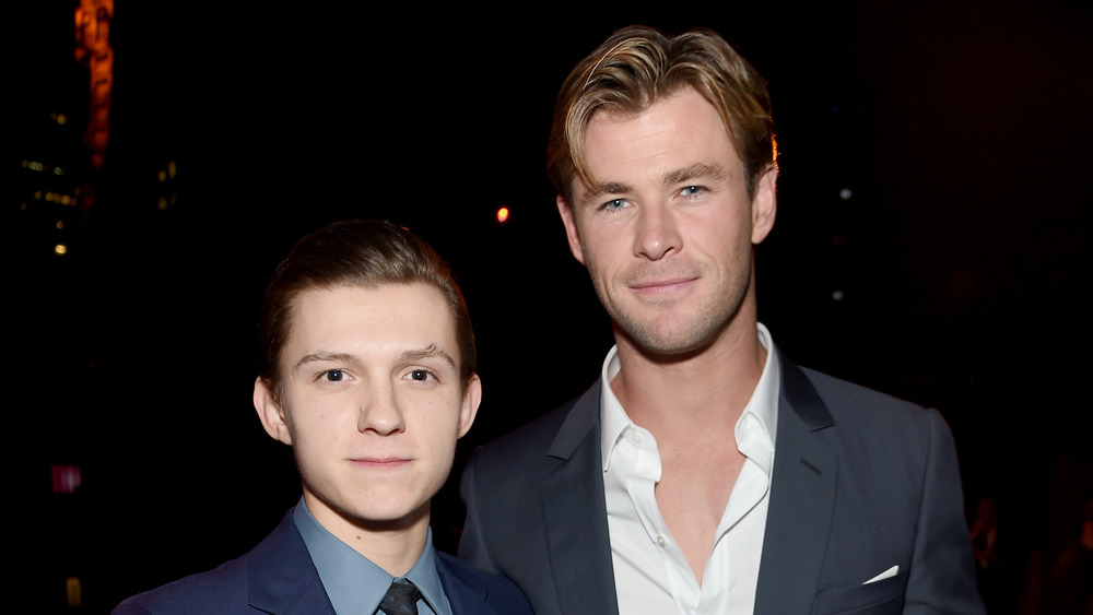 Tom Holland and Chris Hemsworth Posing for a picture