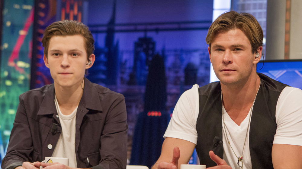 Tom Holland and Chris Hemsworth being interviewed