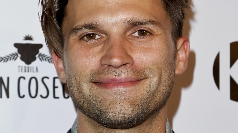  Tom Schwartz smiling short stubble beard