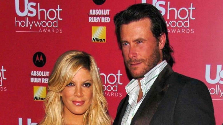 Tori Spelling and Dean McDermott pose