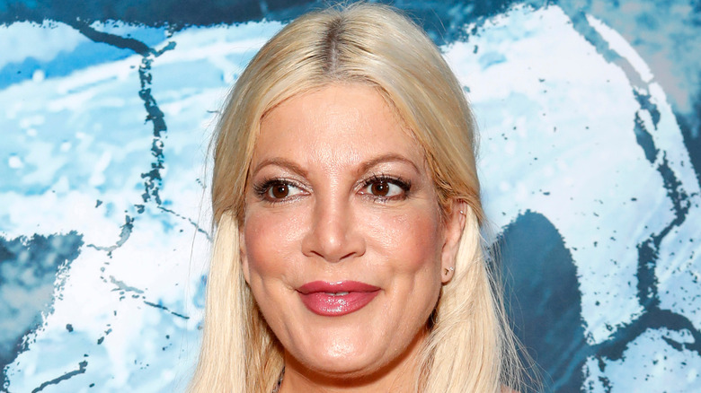 Tori Spelling smiles 