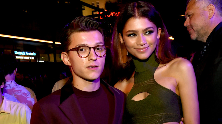 Tom Holland and Zendaya posing