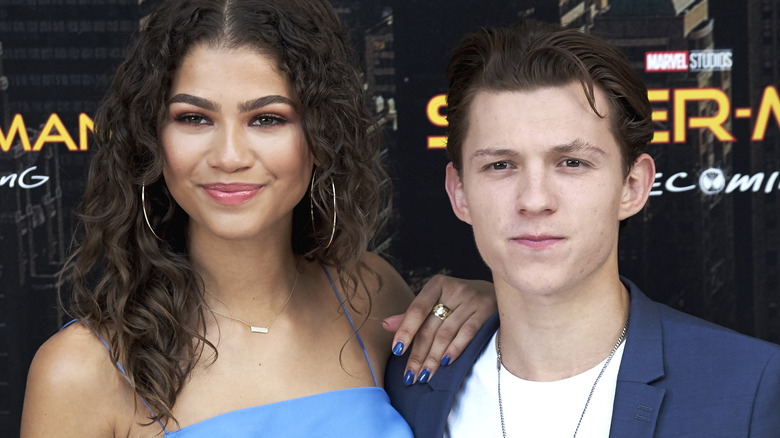 Zendaya smiles alongside Tom Holland
