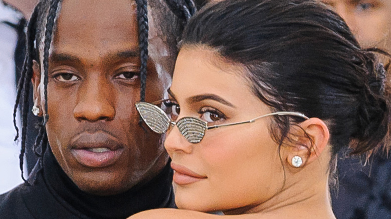 Travis Scott and Kylie Jenner posing