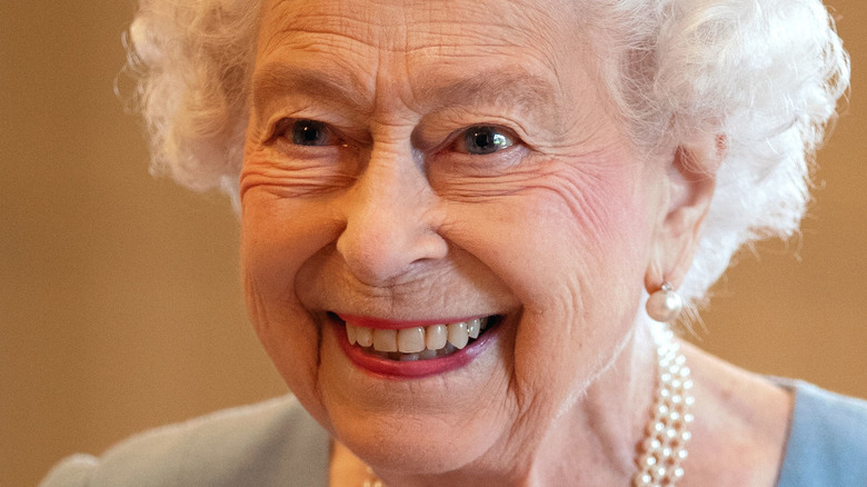 Queen Elizabeth grinning big