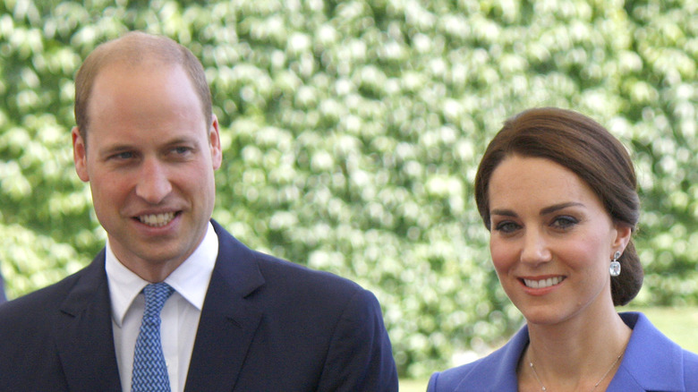 Prince William navy suit Kate Middleton diamond earrings