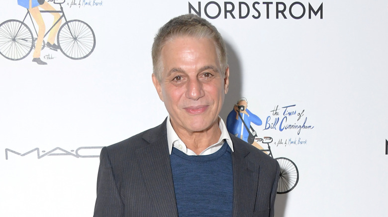 Tony Danza smiling in front of Nordstrom wall