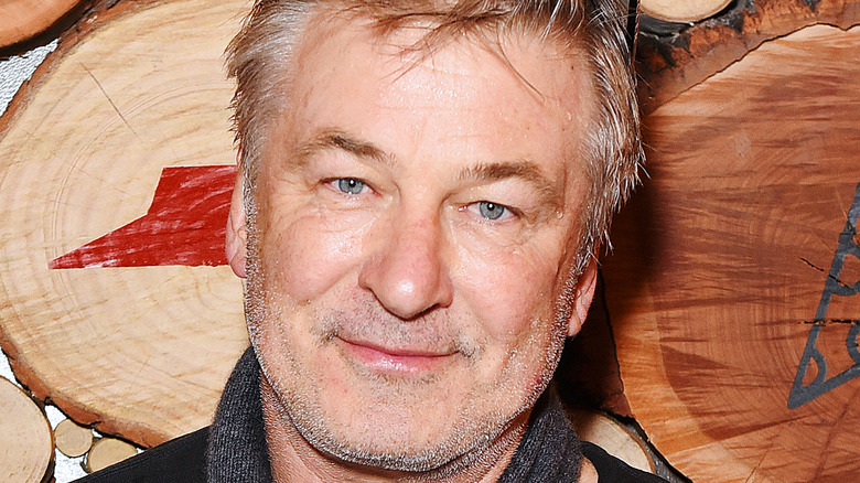 Actor Alec Baldwin posing at Pizza Hut event 