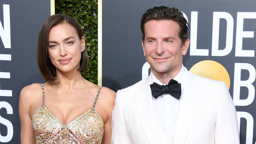 Irina Shayk and Bradley Cooper at an event 