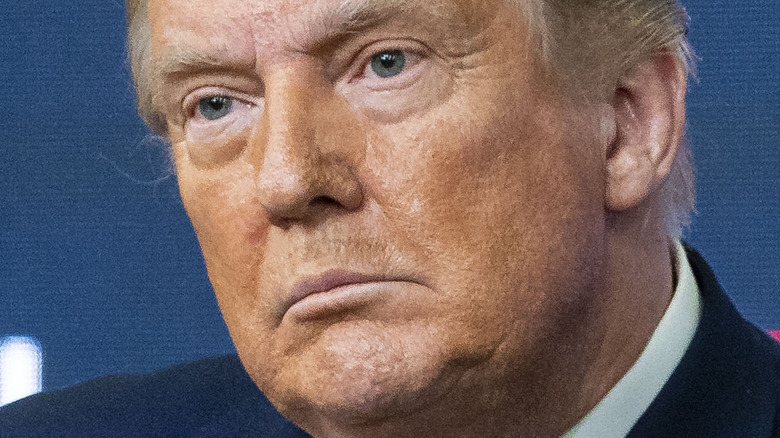 Donald Trump frowning head tilted