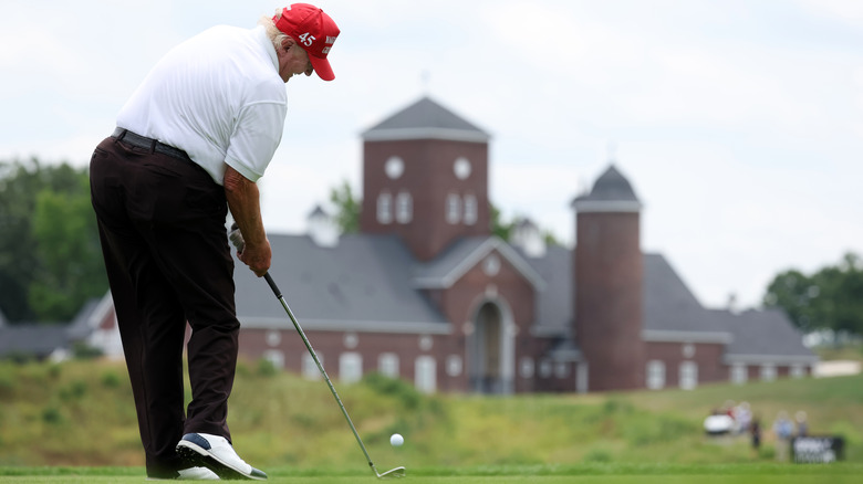 Donald Trump playing golf club