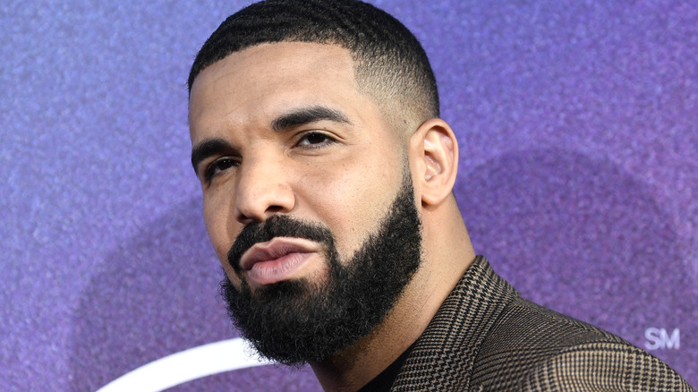 Drake gazing in close-up on the red carpet