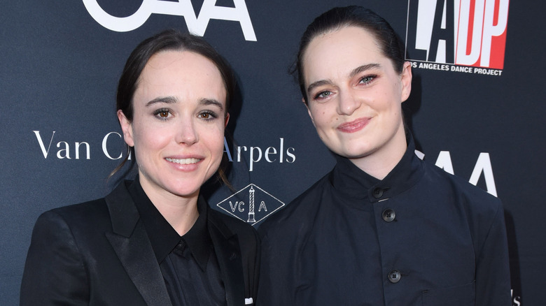 Elliot Page smiling wife Emma Portner