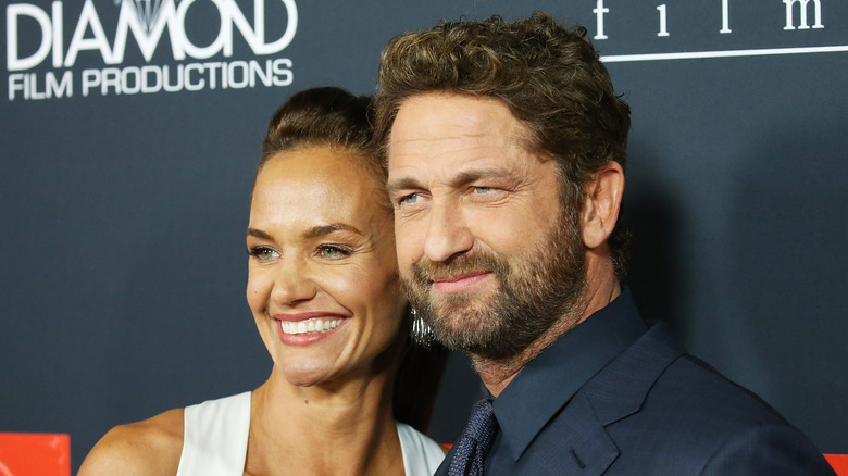 Morgan Brown smiling with Gerard Butler