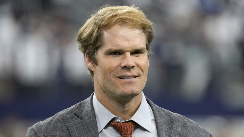 Greg Olsen poses in a suit