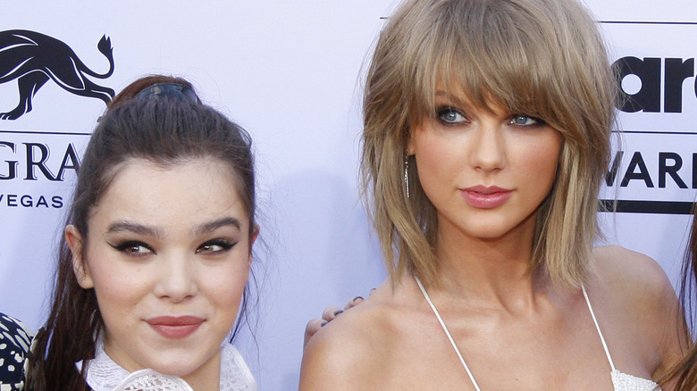 Hailee Steinfeld and Taylor Swift with Billboard