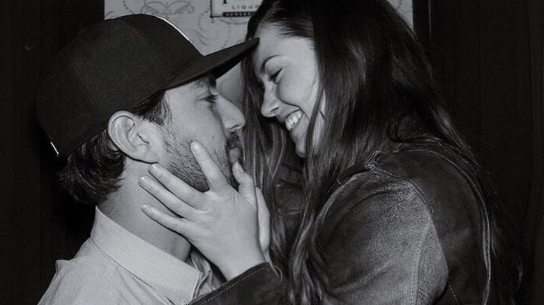 Merritt Patterson and JR Ringer smile at each other