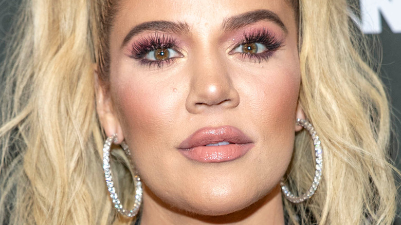 Khloe Kardashian stares into the camera