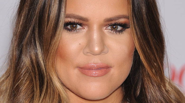 Khloe Kardashian with a neutral expression