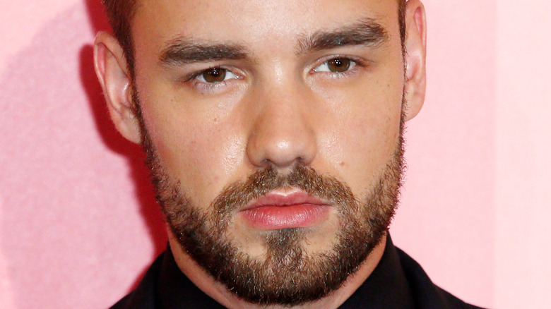 Liam Payne with a serious expression