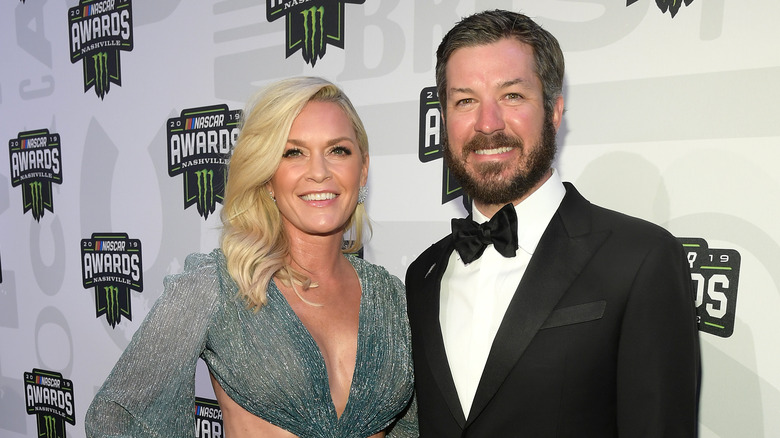 Sherry Pollex posing with Martin Truex Jr. 