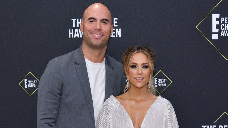 Mike Caussin and Jana Kramer on a red carpet