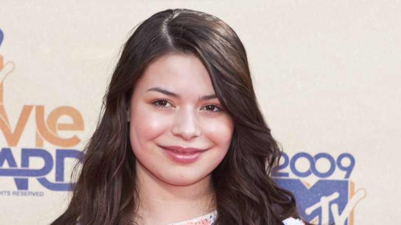 Miranda Cosgrove attends an event
