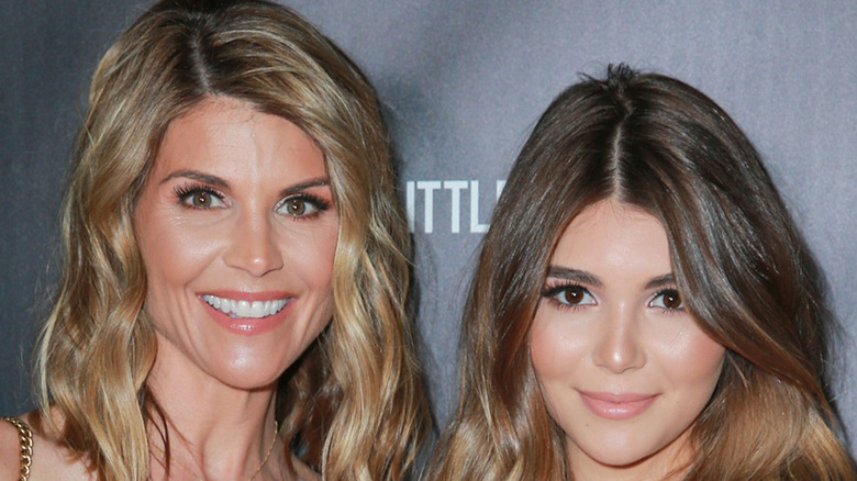 Lori Loughlin and Olivia Jade posing for cameras 