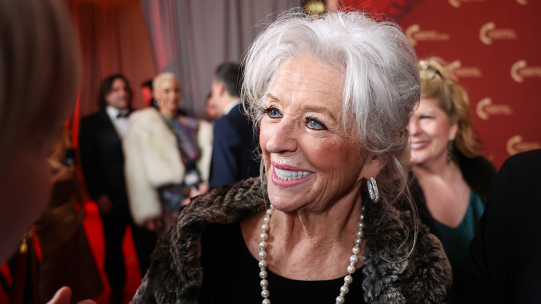 Paula Deen walking the red carpet at the Turning Point USA Inaugural-Eve Ball at the Salamander Hotel