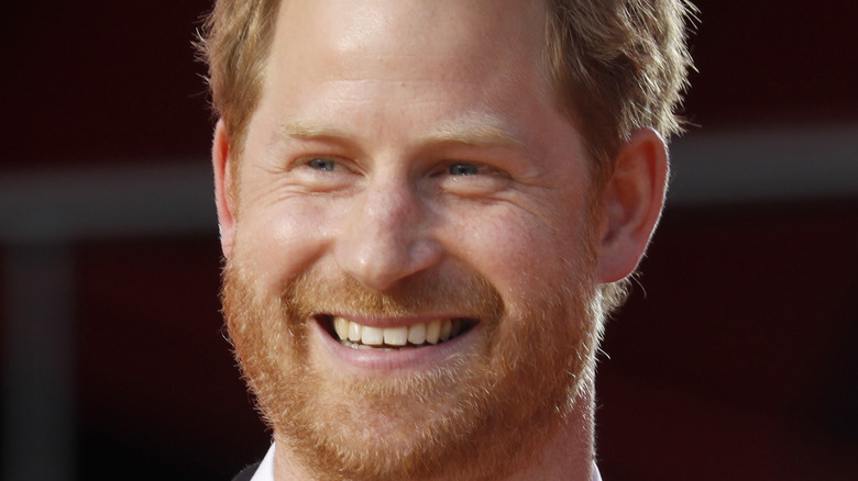 Prince Harry smiling at an event