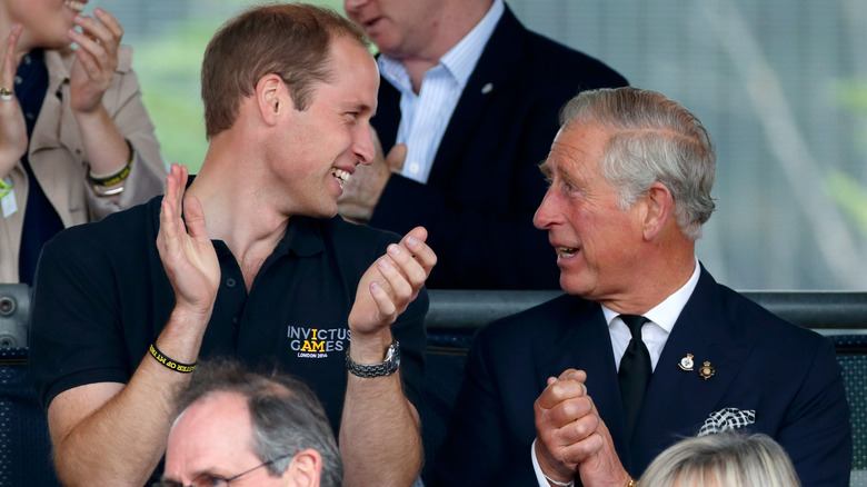 Prince William and Prince Charles chatting