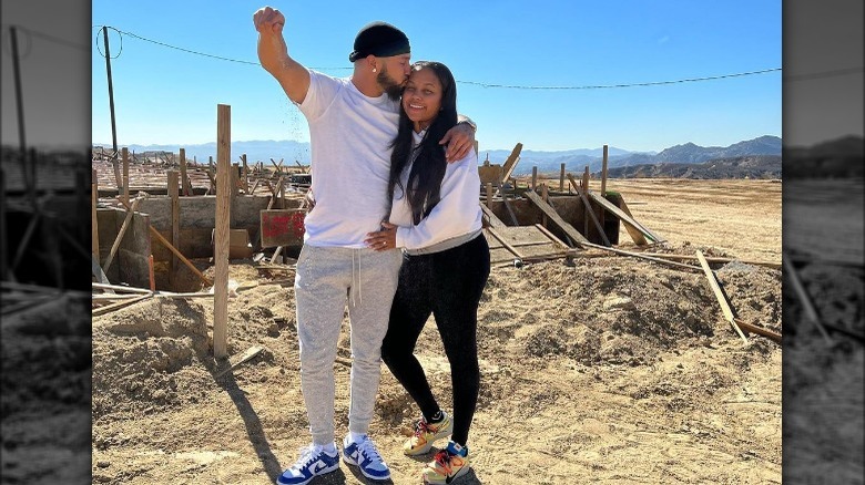 Cheyenne Floyd and Zach Davis standing on building site