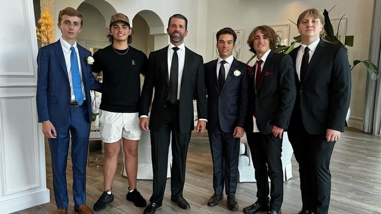 Donald Trump Jr. posing with friends