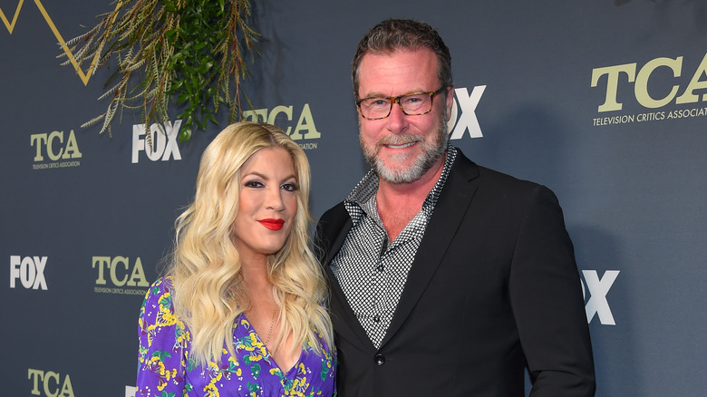 Tori Spelling and Dean McDermott pose 